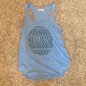 A light blue tank top with a sparkly design